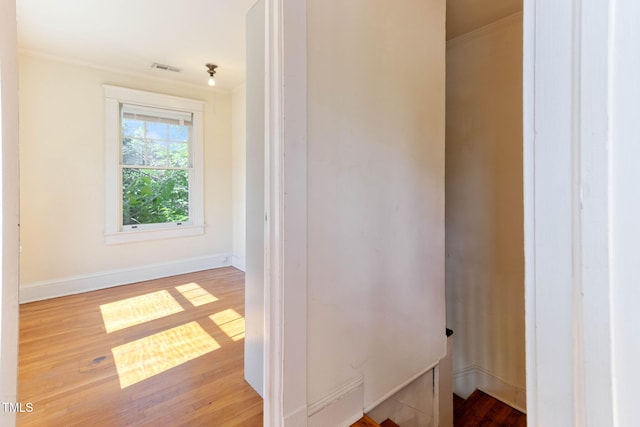 1308 Wake Forest Rd, Raleigh, NC 27604 - hallway with ornamental molding, wood finished floors, and baseboards