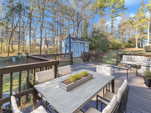 wooden deck featuring an outdoor hangout area and a shed