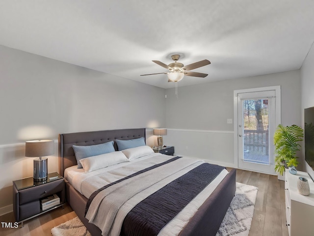 bedroom featuring ceiling fan, access to outside, baseboards, and light wood-style floors