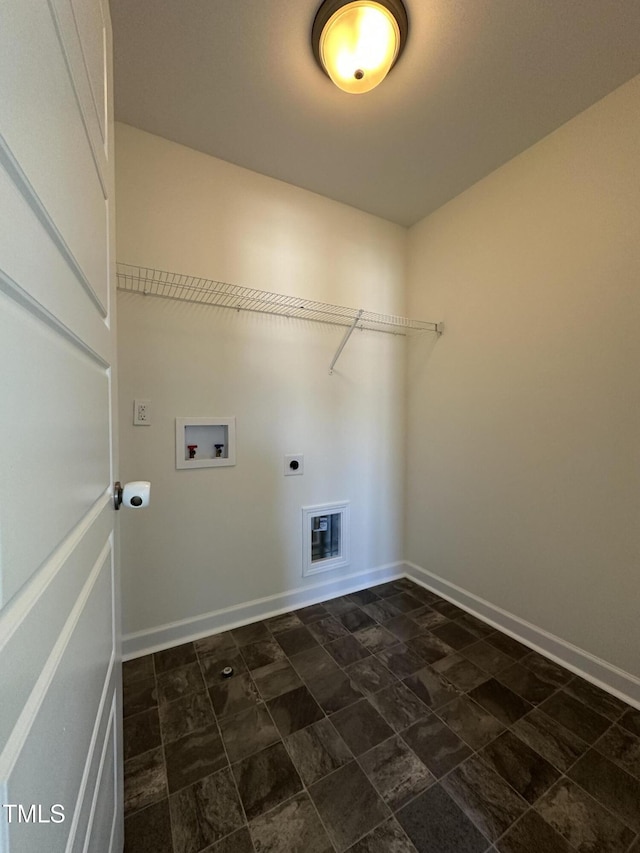 washroom with hookup for an electric dryer and hookup for a washing machine