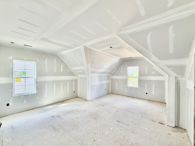 bonus room featuring vaulted ceiling