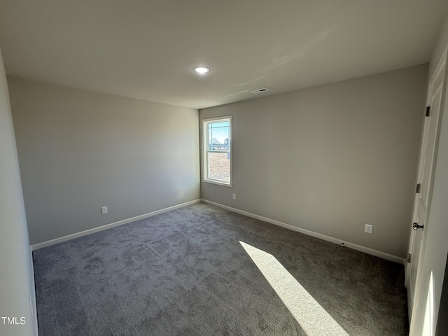 view of carpeted spare room