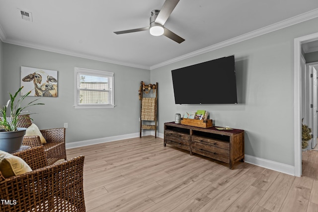 sitting room featuring crown molding, ceiling fan, and light hardwood / wood-style flooring