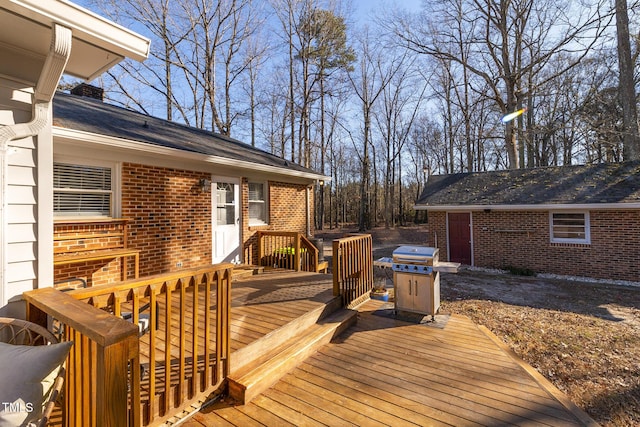 deck with an outbuilding