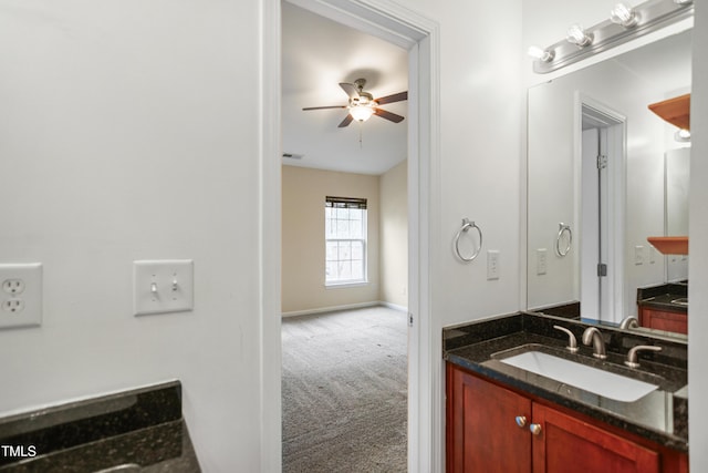 bathroom featuring vanity and ceiling fan