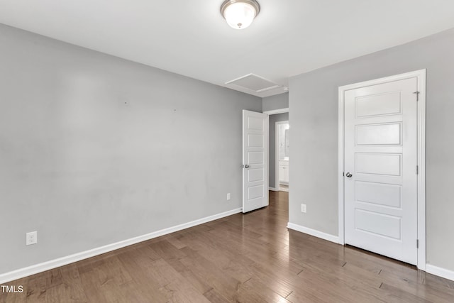 unfurnished bedroom featuring wood-type flooring