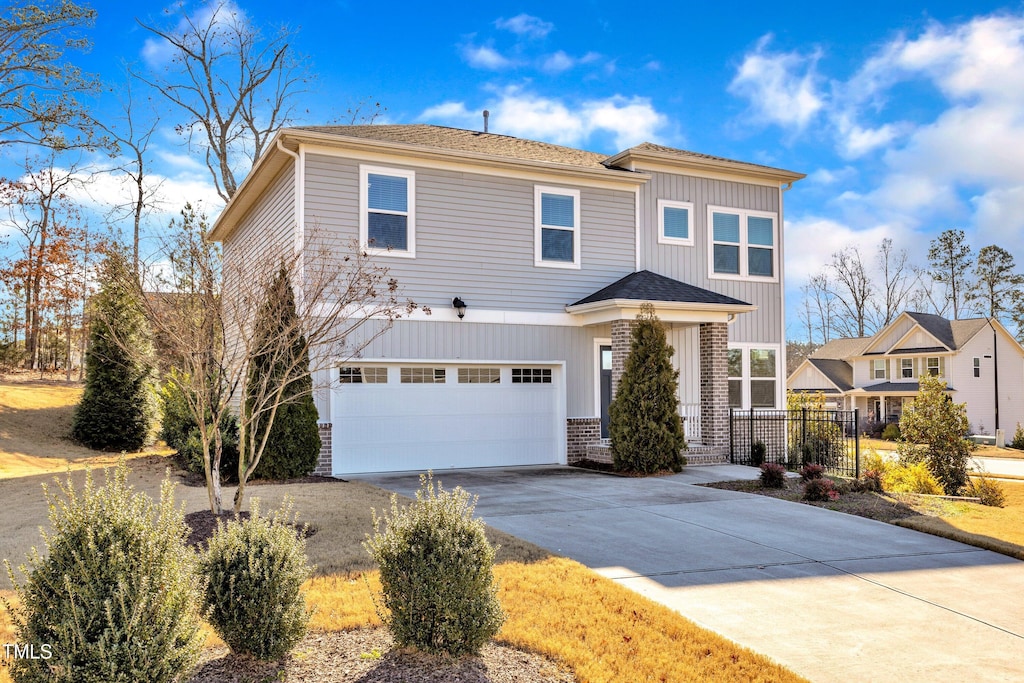 view of front of home with a garage