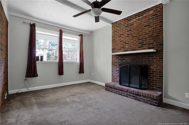 unfurnished living room featuring carpet flooring, ceiling fan, and a fireplace