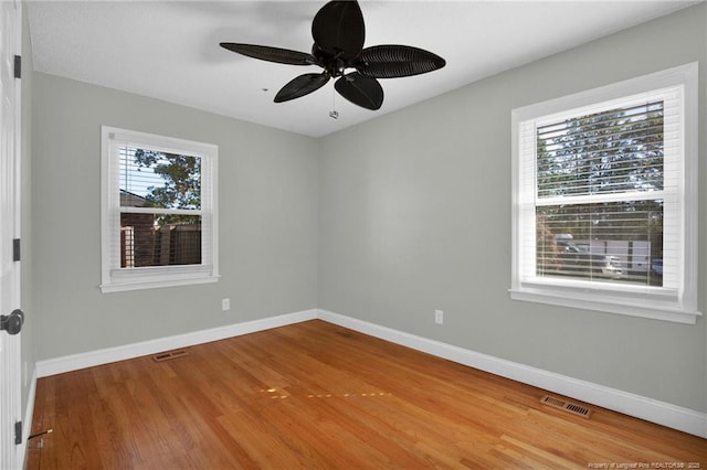 unfurnished room featuring wood-type flooring and ceiling fan