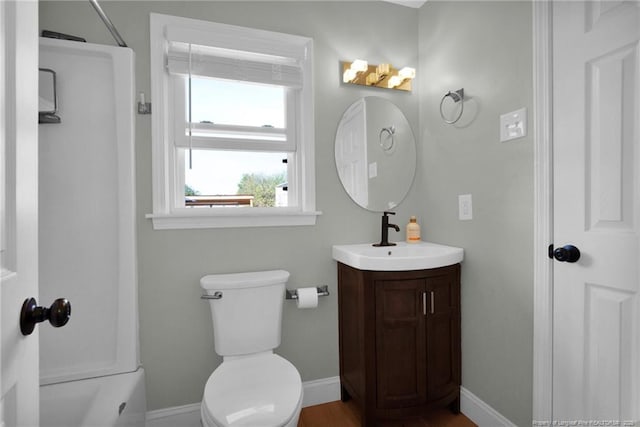 full bathroom featuring vanity,  shower combination, and toilet