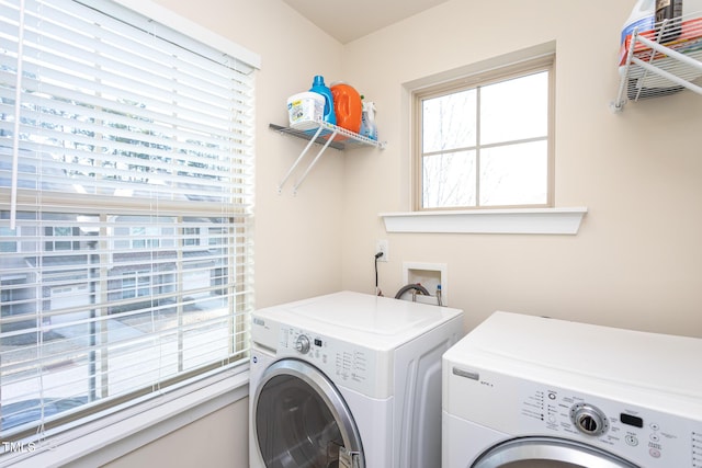 washroom with washer and clothes dryer