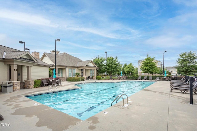 view of pool with a patio area