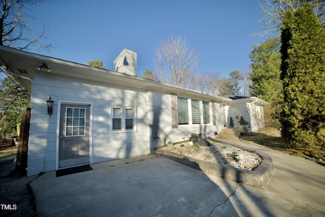 rear view of house with a patio area