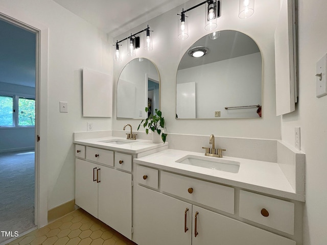 bathroom featuring vanity and tile patterned flooring