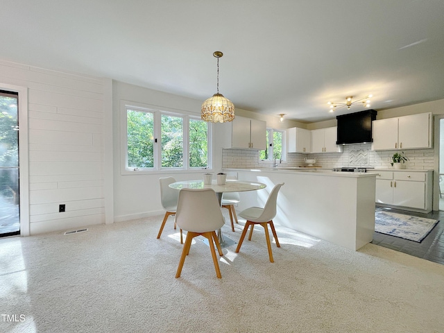 dining area featuring sink