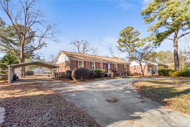 view of front of property with a carport