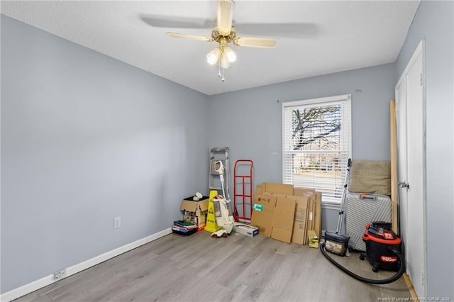 storage room with ceiling fan