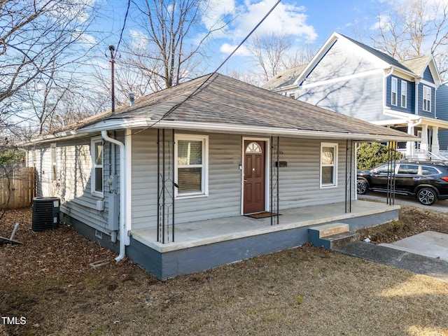 view of front facade featuring central AC unit and covered porch