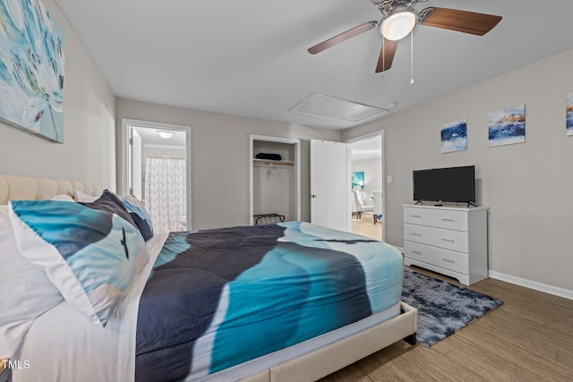 bedroom featuring ceiling fan, hardwood / wood-style flooring, and a closet