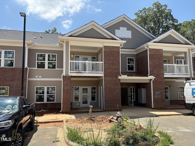 615 Weather Ridge Ln Unit 27, Cary, NC 27513 - townhome / multi-family property featuring brick siding and a balcony