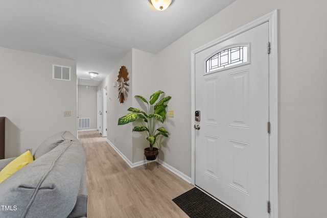 foyer with light hardwood / wood-style flooring