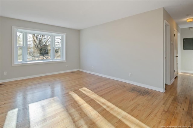 empty room with light wood-type flooring