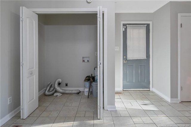 washroom with hookup for an electric dryer and hookup for a washing machine