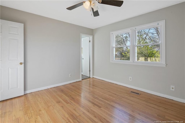 unfurnished bedroom with light hardwood / wood-style flooring and ceiling fan