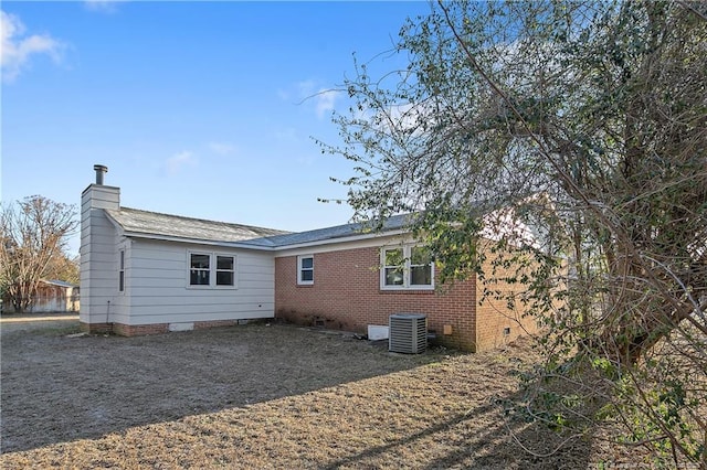 back of property featuring cooling unit