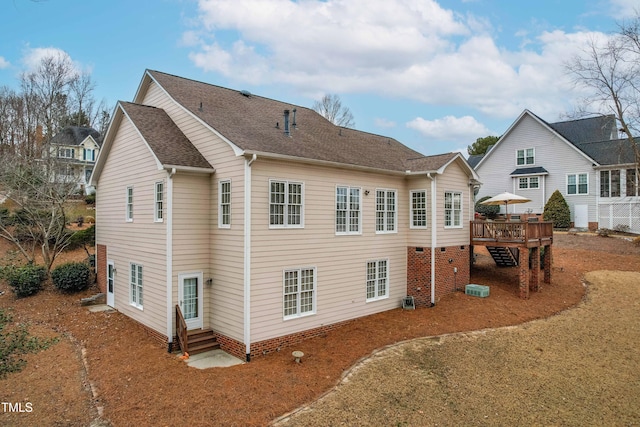 back of property featuring entry steps, a shingled roof, cooling unit, and a wooden deck