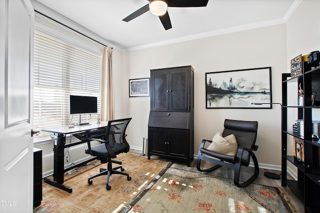 office area with ornamental molding, ceiling fan, and light hardwood / wood-style floors