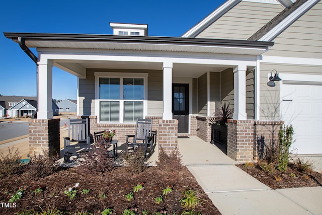 entrance to property with covered porch