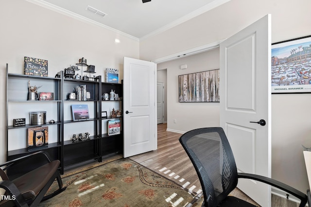 office space featuring hardwood / wood-style flooring and ornamental molding