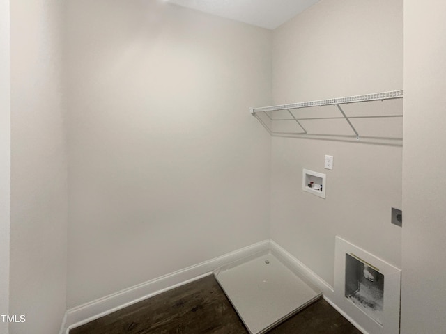 washroom featuring hookup for an electric dryer, washer hookup, and dark wood-type flooring