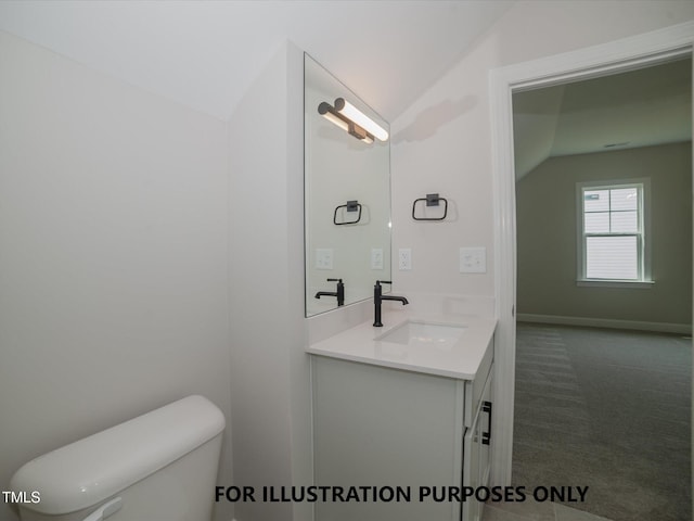 bathroom with lofted ceiling, toilet, and vanity