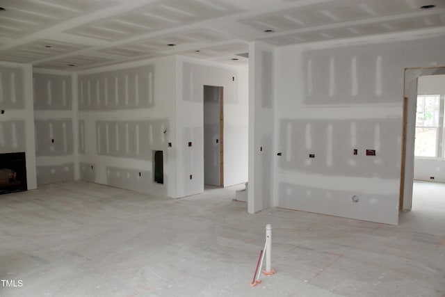 unfurnished living room featuring a fireplace