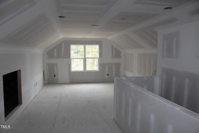 bonus room with vaulted ceiling