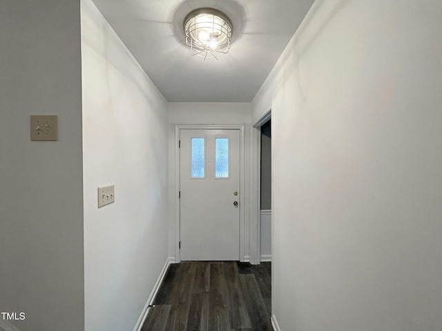 doorway to outside featuring dark hardwood / wood-style floors