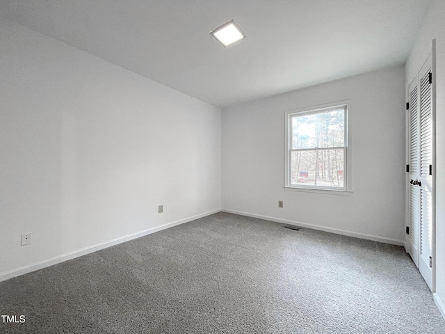 unfurnished bedroom featuring carpet flooring