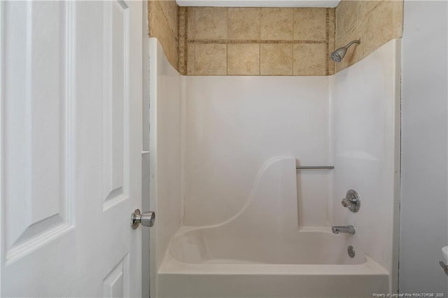 bathroom featuring washtub / shower combination