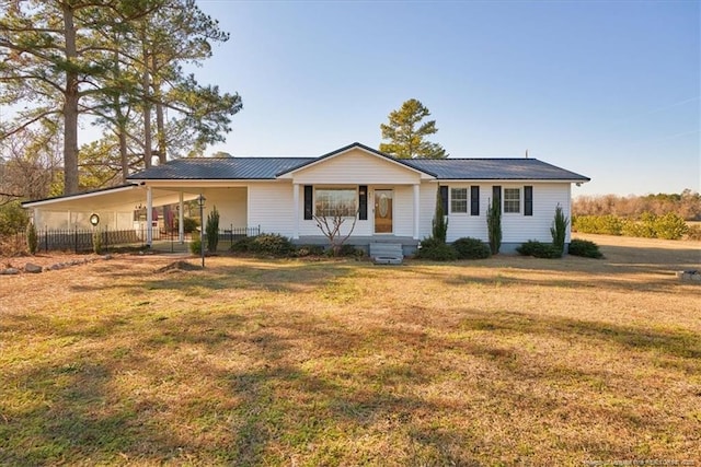 single story home featuring a front lawn, a porch, and a carport