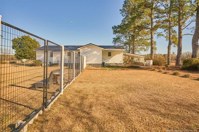 view of yard featuring a carport