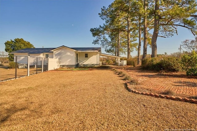 exterior space featuring a carport