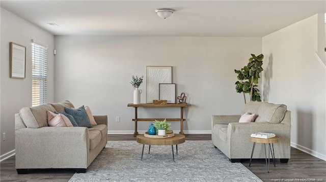 living room with dark wood-type flooring