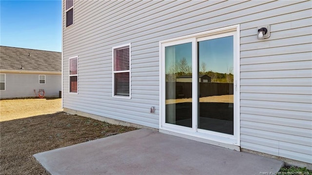 view of home's exterior featuring a patio area