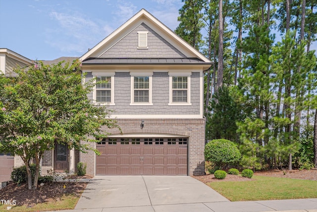 view of front of property with a garage