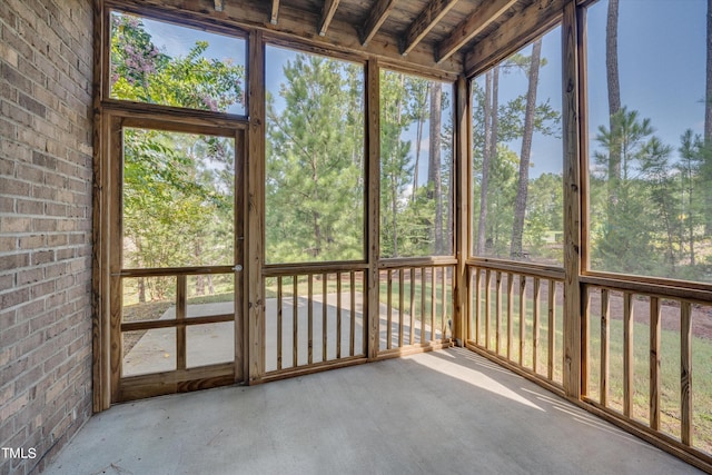 unfurnished sunroom with a wealth of natural light