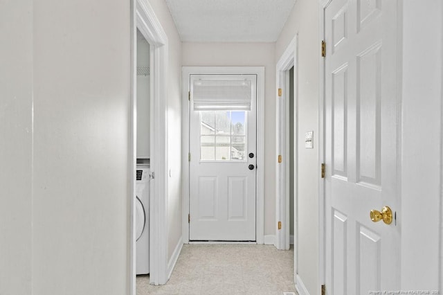 entryway featuring washer / clothes dryer