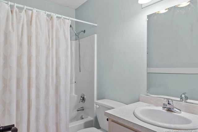 full bathroom with shower / bath combination with curtain, toilet, and vanity