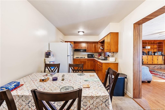 kitchen featuring white fridge and built in features